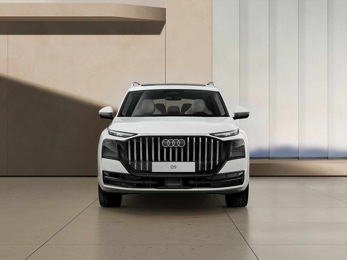 Audi Q9 von vorn vor einer Wand Audi Q9 von vorn vor einer Wand