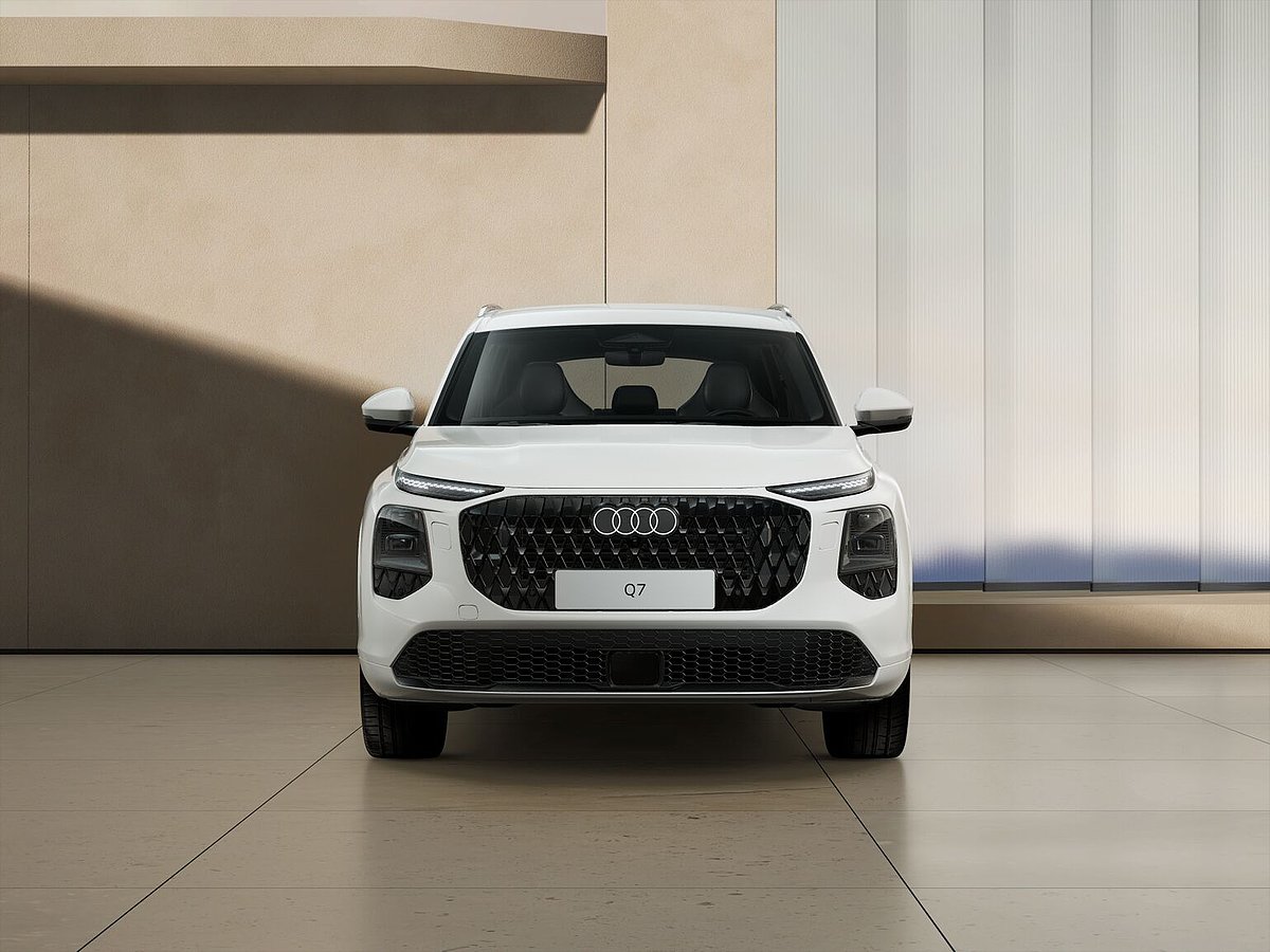 Audi Q7 von vor vor einer Wand Audi Q7 von vor vor einer Wand