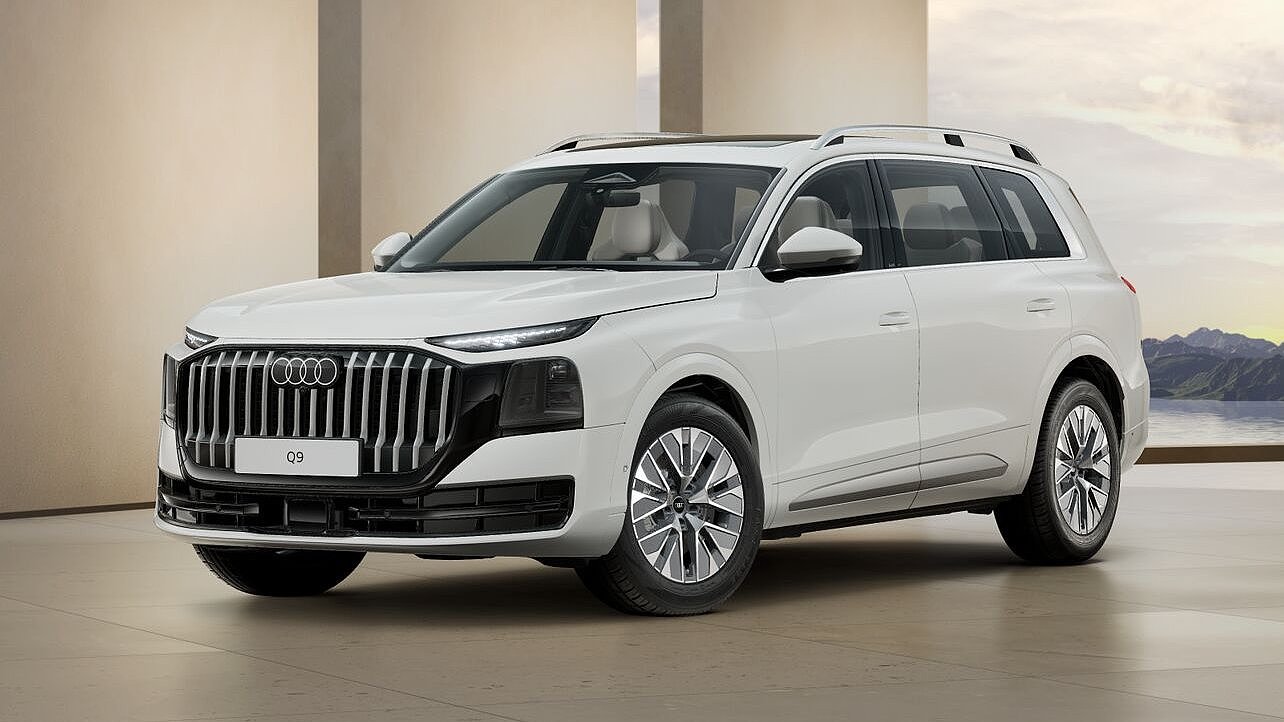 Audi Q9 schräg von vorn vor einer Wand Audi Q9 schräg von vorn vor einer Wand