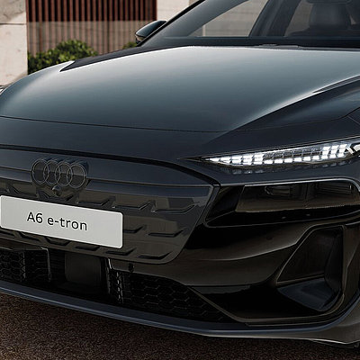 Detailansicht der Front des Audi A6 e-tron mit LED-Scheinwerfern und geschlossenem Kühlergrill
