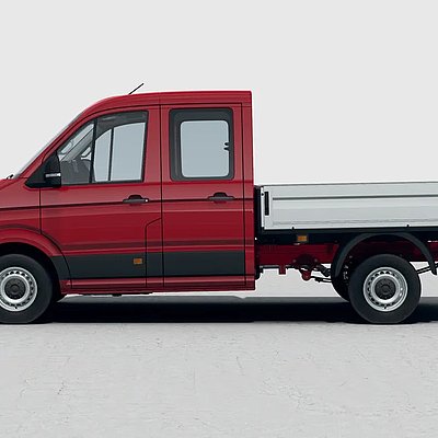 Roter Volkswagen Crafter Pritsche in der Seitenansicht
