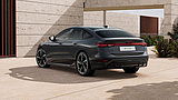 Grauer Audi A6 e-tron in schräger Heckansicht vor moderner Architektur