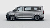 Grauer VW Transporter in der Seitenansicht auf hellem Untergrund.