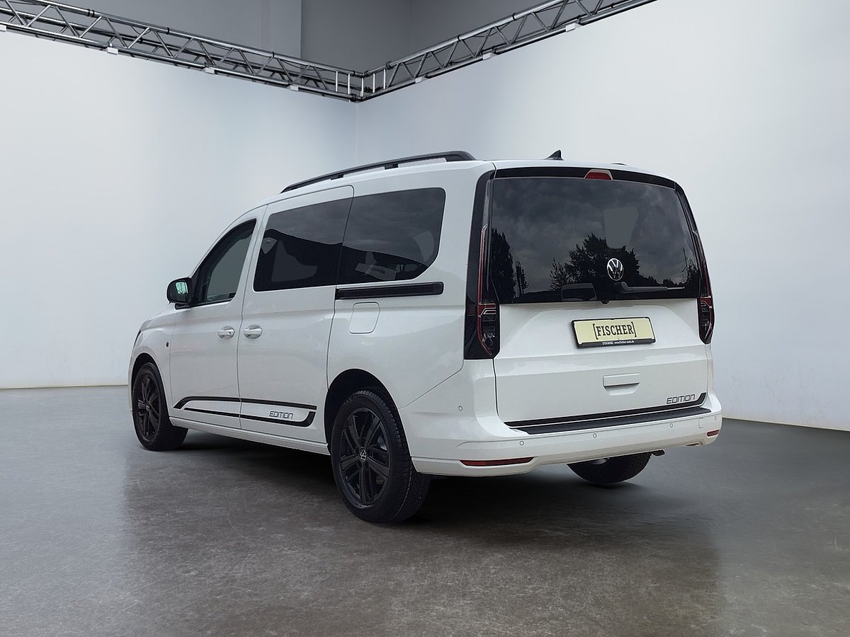 VW NFZ Caddy Edition weiß schräg von hinten VW NFZ Caddy Edition weiß schräg von hinten