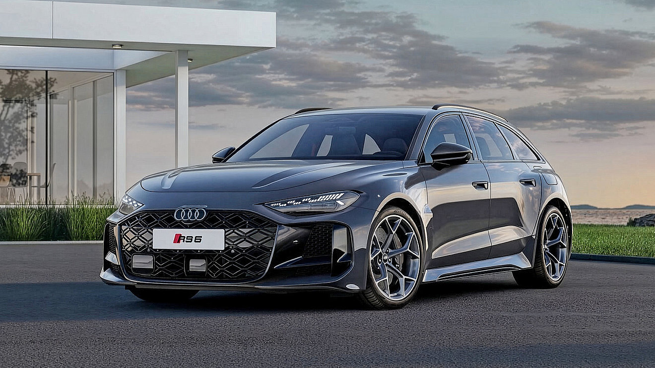 Grauer Audi RS 5 Avant als sportlicher Premium-Kombi in dynamischer Front-Seitenansicht vor moderner Architektur – mit markantem Singleframe-Kühlergrill, LED-Scheinwerfern und großen Leichtmetallfelgen.